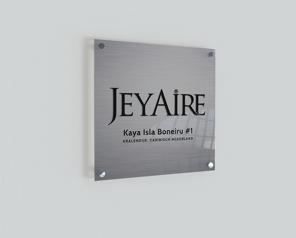 Mockup JeyAire signage design.
